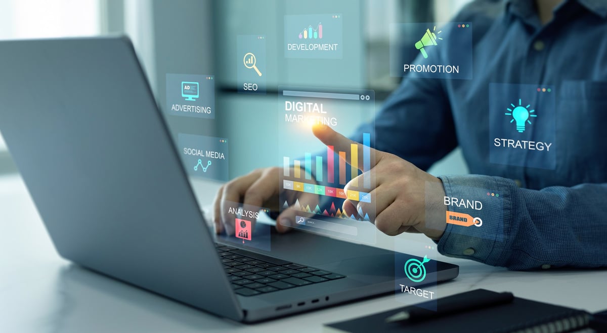 Digital marketing strategy with laptop showing social media analytics