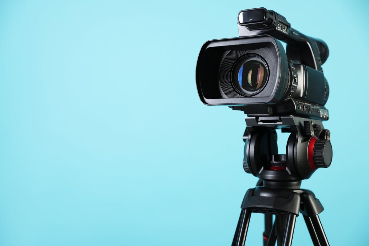 Professional video camera on tripod for live streaming